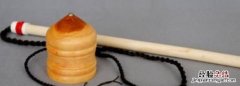 陀螺是什么形状，陀螺的陀是什么意思要字典上恰当的解释