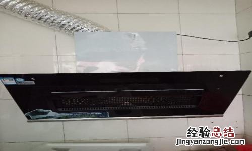 油烟机储油盒怎么拿出来