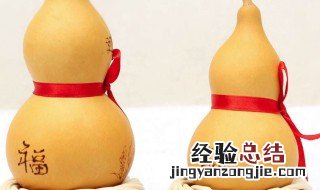 葫芦挂在进门的左边还是右边 正对入户门的墙上挂什么画合适