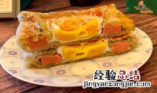 手抓饼鸡蛋加肠的做法 早餐—鸡蛋肉肠手抓饼的做法