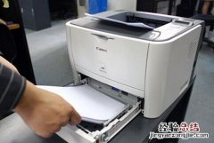 打印机放纸后按什么按钮