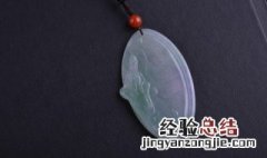 翡翠钠长石什么意思 钠长石玉原石图片